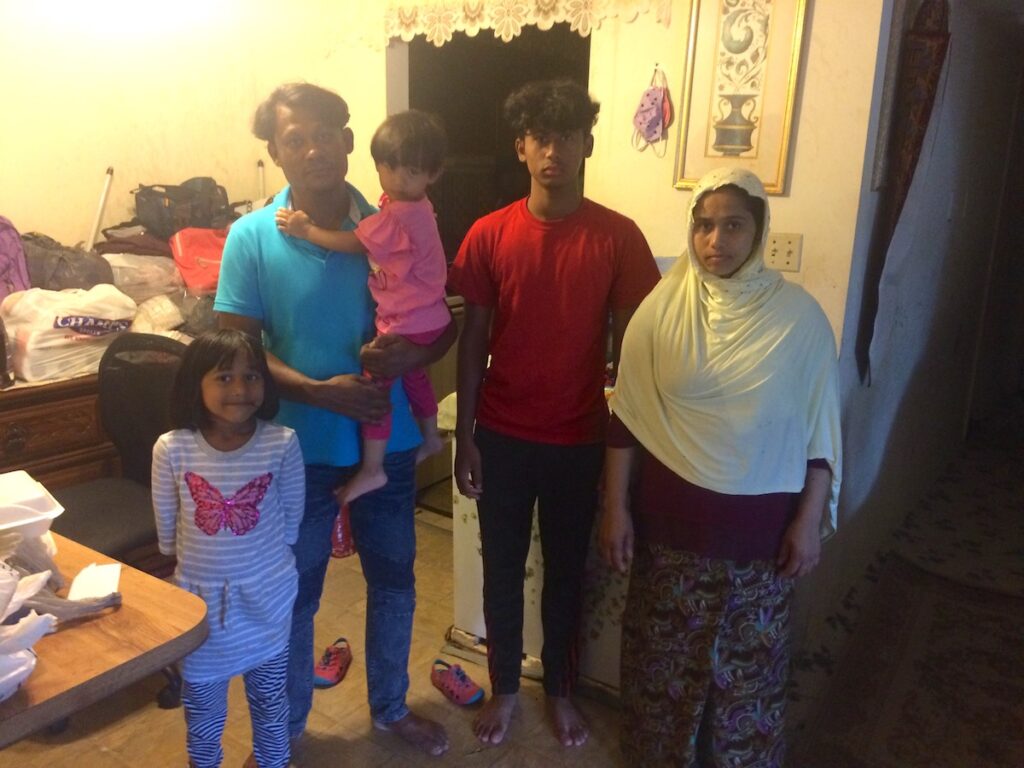 Group photograph of refugee community members